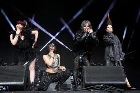 2NE1 performs with 88rising onstage at the Coachella Stage during the 2022 Coachella Valley Music And Arts Festival on April 16, 2022 in Indio, Calif. 
