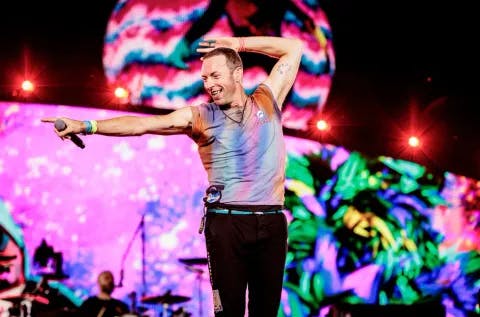 Chris Martin of Coldplay performs at Stadio San Siro, on June 25, 2023 in Milan, Italy. 