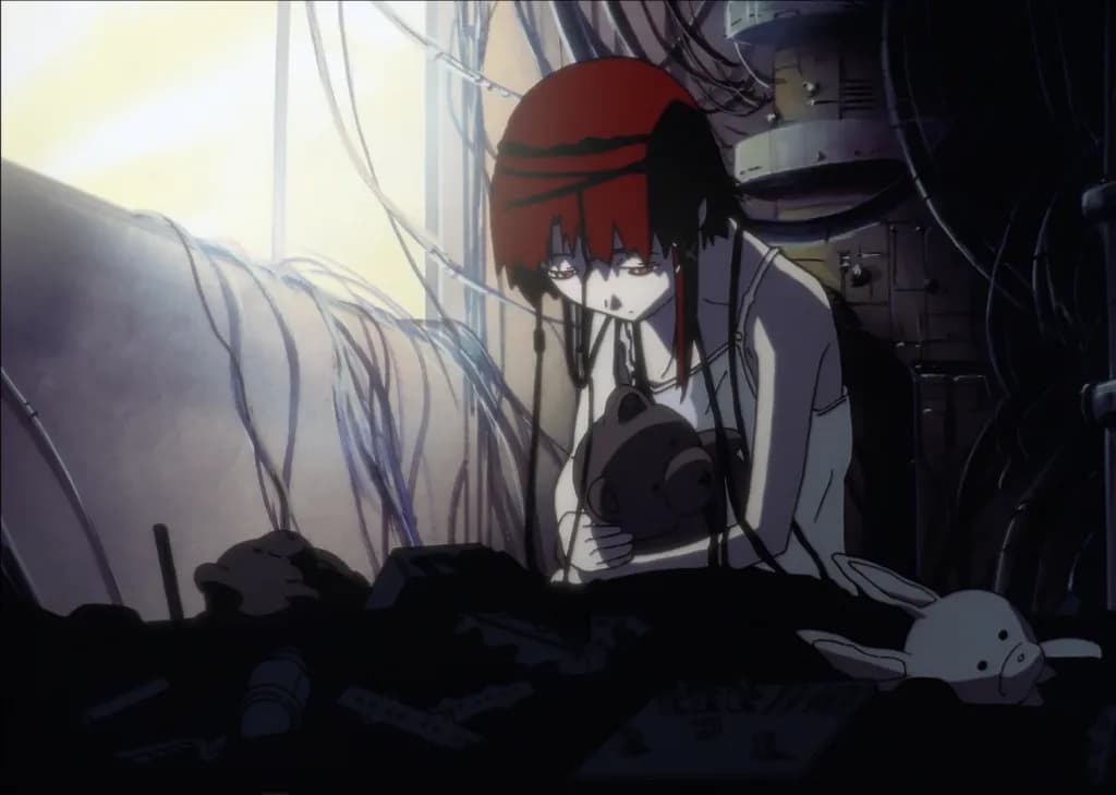 Lain on her bed with wires connected to her