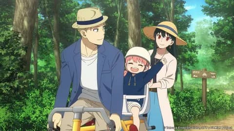 Anya, Loid, and Yor Forger on a bike