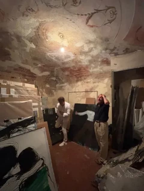 Artist Jean Charles Blais with the newly unearthed Roman funerary stone in his studio in Vence, France.