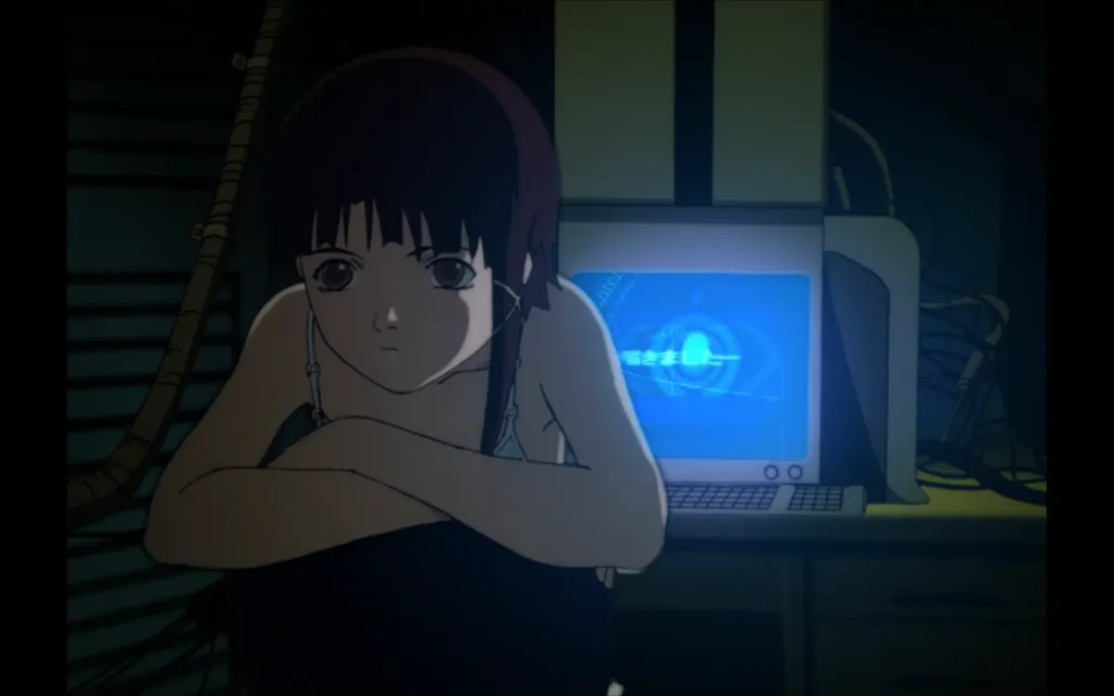 Laine sitting with computer behind her